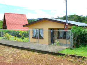 The house is close to the paved road to Tierras Morenas.